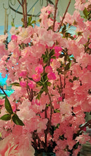 Zijden bloesemtak in licht- of hardroze