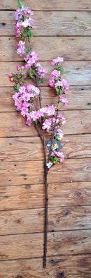 Zijden bloesemtak in licht- of hardroze