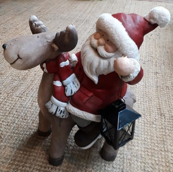 Kerstman op rendier